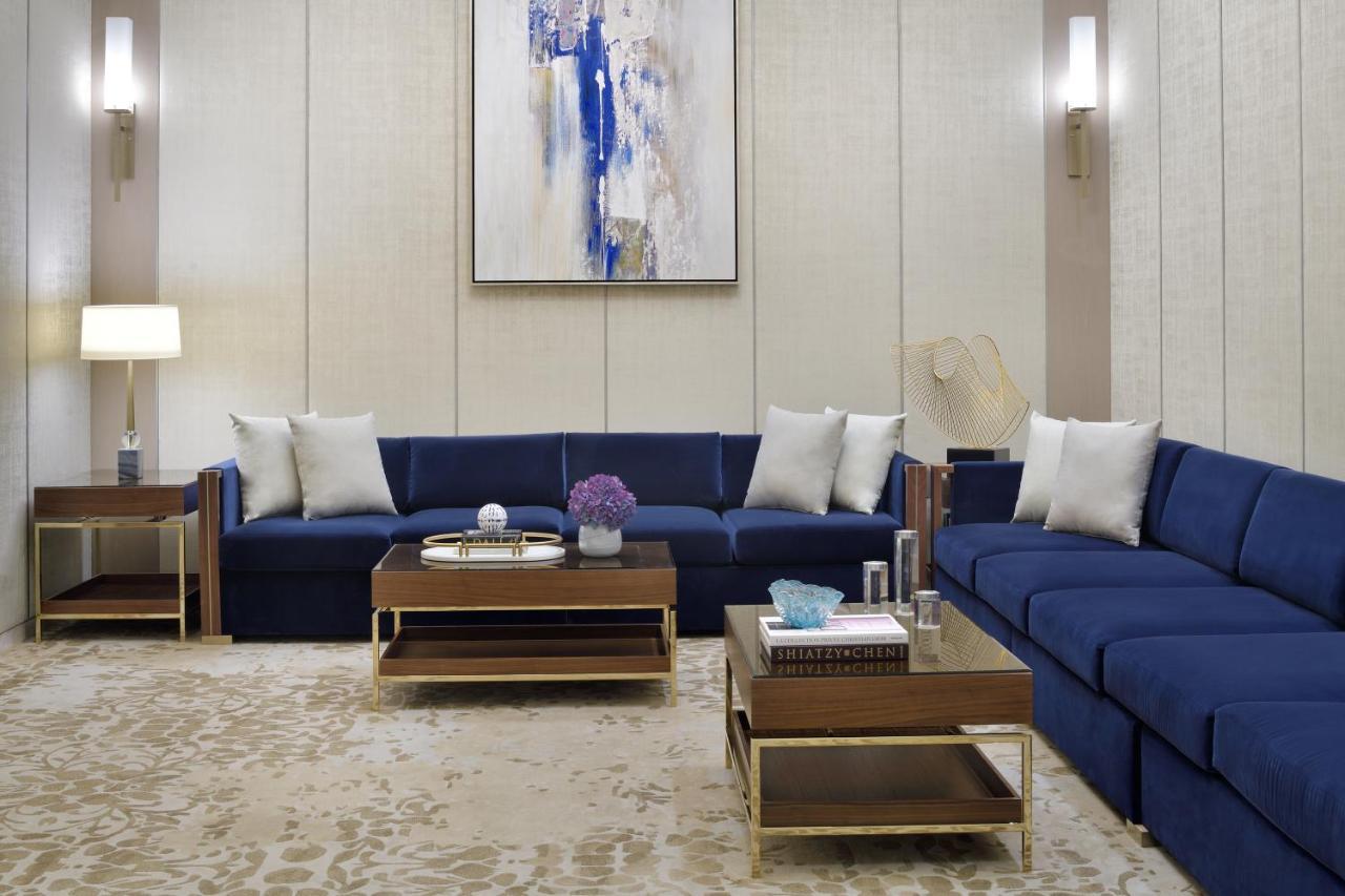 Address Dubai Mall Exterior foto A living room at The Ritz-Carlton, Boston